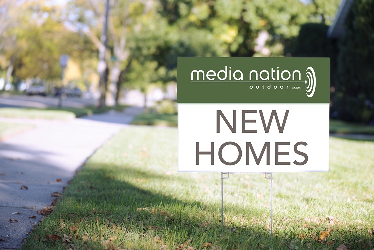 white sign with clipping path on front lawn during sunny day.